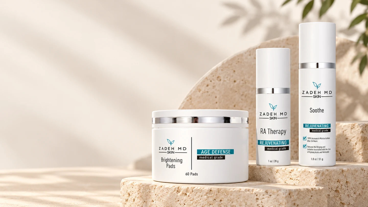 Brightening Pads, RA Therapy and Soothe displayed together on warm stone plinths